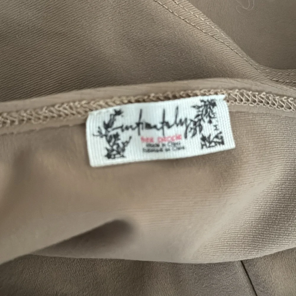 Free People | Keep It Sleek V-neck Sleeveless Bodysuit - Picture 14 of 15